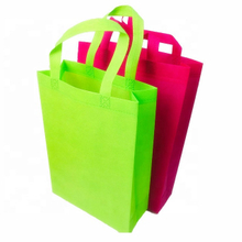 Disposable colorful non woven handle bag manufacturer